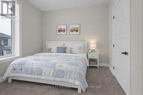 Virtually Staged - 606 - 361 Quarter Town Line, Tillsonburg, ON - Indoor Photo Showing Bedroom