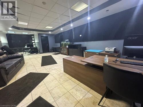 Office area with a paneled ceiling - 1659 Victoria Street N, Kitchener, ON 