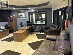 Office area featuring a paneled ceiling - 