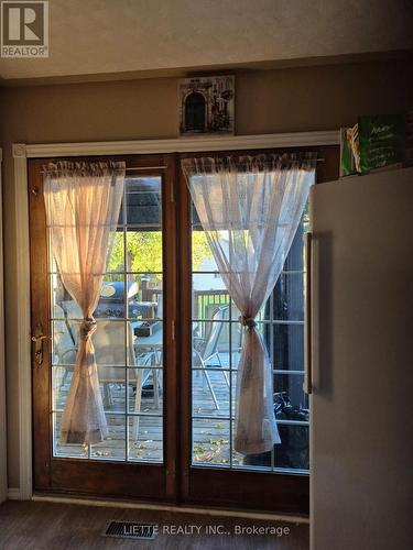 LAUNDRY ROOM LEADING TO REAR DECK  & GAZEBO - 823 Bedford Street N, Cornwall, ON - Indoor Photo Showing Other Room