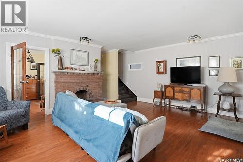 809 6Th Avenue N, Saskatoon, SK - Indoor Photo Showing Living Room With Fireplace