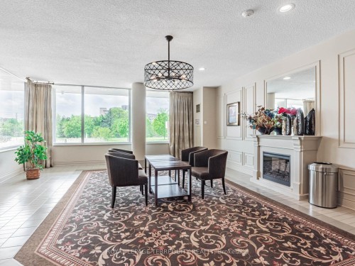 203-326 Major Mackenzie Drive E, Richmond Hill, ON - Indoor With Fireplace