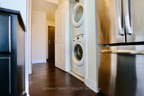 2504-33 Shore Breeze Drive, Toronto, ON - Indoor Photo Showing Laundry Room
