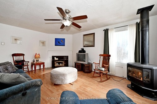 704 Hastings Avenue, Innisfil, ON - Indoor Photo Showing Living Room With Fireplace