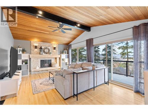 Living room - 11609 Upper Summit Drive, Coldstream, BC - Indoor Photo Showing Living Room With Fireplace
