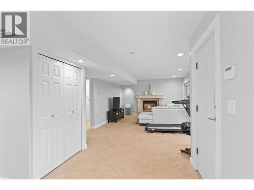 Looking to Rec room - 11609 Upper Summit Drive, Coldstream, BC - Indoor Photo Showing Other Room