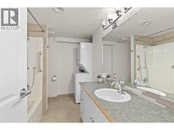 4pc bathroom with laundry in the in-law suite - 
