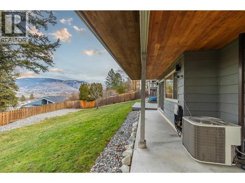View of lower level covered deck - 11609 Upper Summit Drive, Coldstream, BC - Outdoor With Exterior