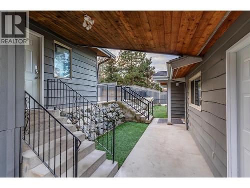 Breezeway from garage to home - 11609 Upper Summit Drive, Coldstream, BC - Outdoor With Deck Patio Veranda With Exterior