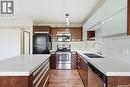 408 1303 Paton Crescent, Saskatoon, SK  - Indoor Photo Showing Kitchen With Stainless Steel Kitchen With Double Sink With Upgraded Kitchen 