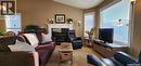 247 Blackburn Crescent, Saskatoon, SK  - Indoor Photo Showing Living Room With Fireplace 