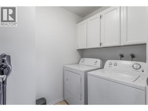 Spacious in Unit Laundry Room with Cabinets - 1075 Bernard Avenue Unit# 308, Kelowna, BC - Indoor Photo Showing Laundry Room