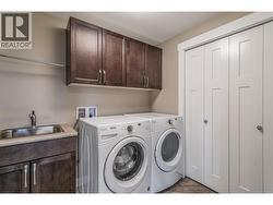 Lower Level Laundry Room with Running water Sink [10'x7'] + Utility Room Area... - 