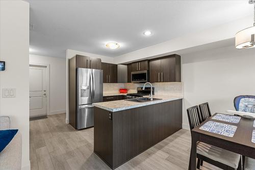 13-335 Gerstmar Road, Kelowna, BC - Indoor Photo Showing Kitchen With Double Sink