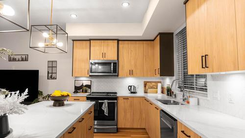  - Indoor Photo Showing Kitchen With Stainless Steel Kitchen With Double Sink With Upgraded Kitchen