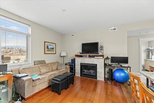 301-4205 Gellatly Road, West Kelowna, BC - Indoor Photo Showing Living Room With Fireplace