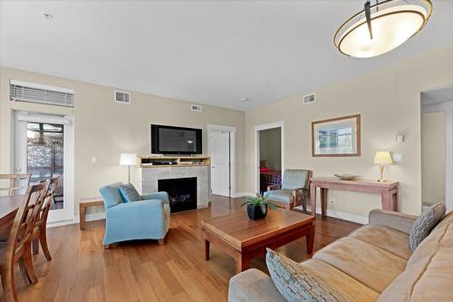 301-4205 Gellatly Road, West Kelowna, BC - Indoor Photo Showing Living Room With Fireplace