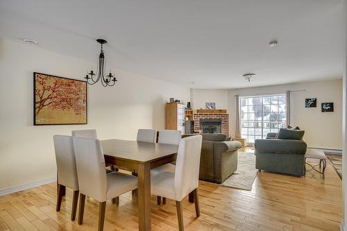 Dining room - 729A Rue Principale, Saint-Sauveur, QC - Indoor With Fireplace