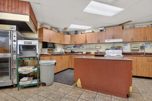 Commerce - 1750 Ch. D'Oka, Deux-Montagnes, QC - Indoor Photo Showing Kitchen With Double Sink