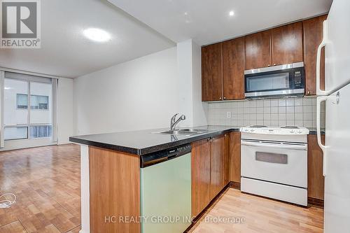 412 - 85 Bloor Street E, Toronto, ON - Indoor Photo Showing Kitchen With Double Sink