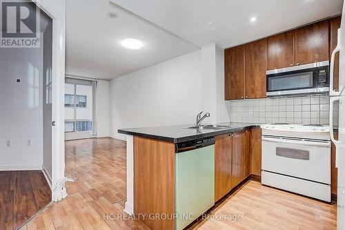412 - 85 Bloor Street E, Toronto, ON - Indoor Photo Showing Kitchen With Double Sink