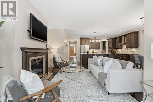 290 Eaton Street, Halton Hills, ON - Indoor Photo Showing Living Room With Fireplace