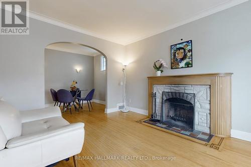 290 Laird Drive, Toronto, ON - Indoor Photo Showing Living Room With Fireplace