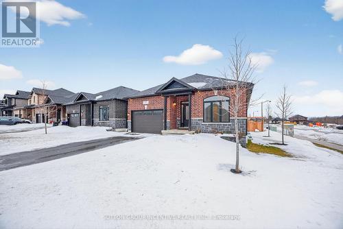 123 Ritchie Crescent, Springwater, ON - Outdoor With Facade