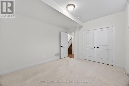 LOWER LEVEL 3RD BEDROOM - 123 Ritchie Crescent, Springwater, ON - Indoor Photo Showing Other Room