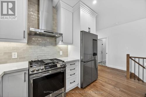 123 Ritchie Crescent, Springwater, ON - Indoor Photo Showing Kitchen With Upgraded Kitchen