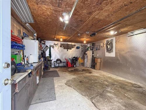 49084 Service Road, Brandon, MB - Indoor Photo Showing Garage