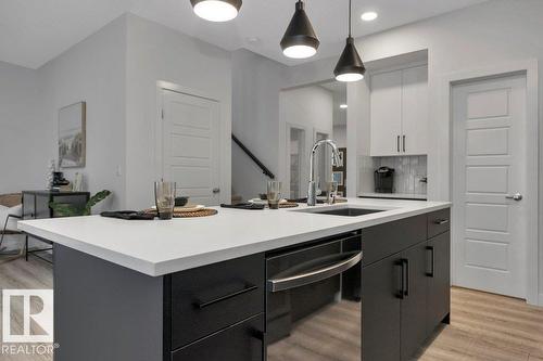 104 Bluff Cv, Leduc, AB - Indoor Photo Showing Kitchen