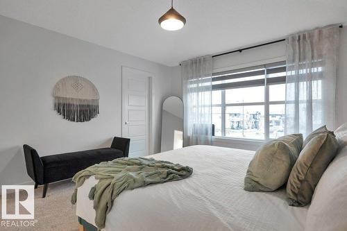 104 Bluff Cv, Leduc, AB - Indoor Photo Showing Bedroom