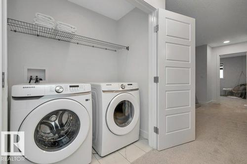 104 Bluff Cv, Leduc, AB - Indoor Photo Showing Laundry Room