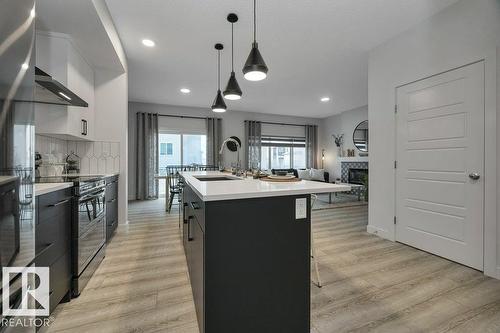 104 Bluff Cv, Leduc, AB - Indoor Photo Showing Kitchen With Upgraded Kitchen