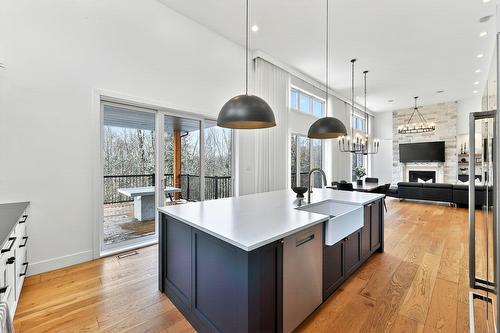 Cuisine - 62 Rue Monette, Saint-Hippolyte, QC - Indoor Photo Showing Kitchen With Fireplace With Upgraded Kitchen