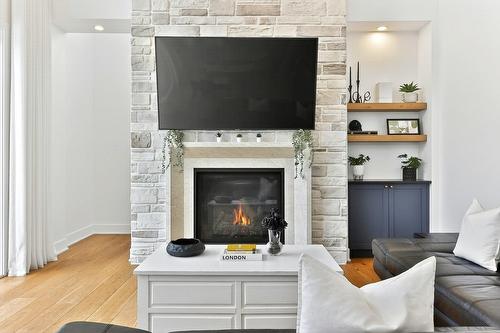 Salon - 62 Rue Monette, Saint-Hippolyte, QC - Indoor Photo Showing Living Room With Fireplace