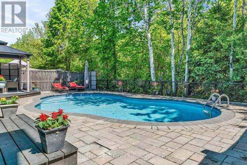 273 Duskywing Way, Oakville, ON - Outdoor With In Ground Pool