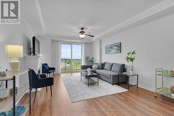 Living room w/ access to full length balcony - 