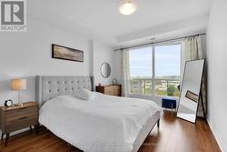 Primary bedroom w/ large window facing north - 