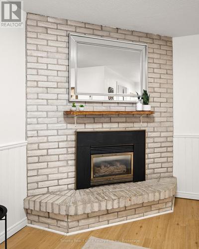 134 Pepperwood Crescent, Kitchener, ON - Indoor Photo Showing Living Room With Fireplace