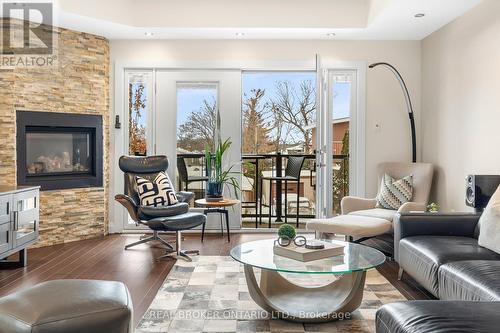 2212 Joanne Avenue, Ottawa, ON - Indoor Photo Showing Living Room With Fireplace