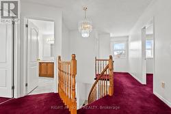 upstairs hallway with linen closet and window - 
