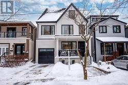 68 RHODES AVENUE  Toronto, ON M4L 2Z9