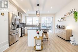 Open concept kitchen with eat-up island - 