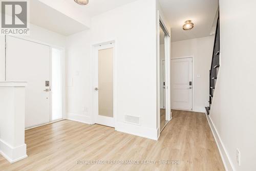 Foyer with powder room, inside entry from garage - 225 Makadewa Private, Ottawa, ON - Indoor Photo Showing Other Room