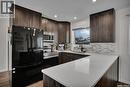 534 David Knight Way, Saskatoon, SK  - Indoor Photo Showing Kitchen With Double Sink With Upgraded Kitchen 