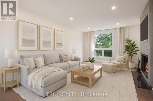 12 Apache Crescent, Ottawa, ON - Indoor Photo Showing Living Room With Fireplace