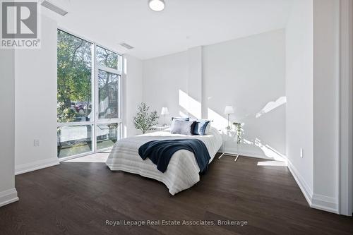 Primary Bedroom - 209 - 42 Mill Street, Halton Hills, ON - Indoor Photo Showing Bedroom
