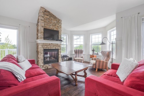 Salon - 17 Av. Des Érables, Saint-Sauveur, QC - Indoor Photo Showing Living Room With Fireplace